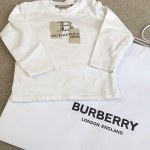 Boys white cotton Burberry shirt. Side buttons on shoulder.